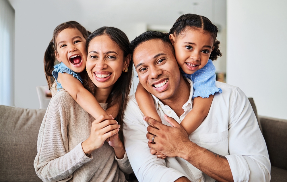 Family smiling together representing comprehensive dental fillings for all ages in Spokane, WA