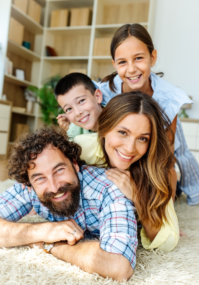 Happy family taking selfie, representing family dental care in Spokane WA