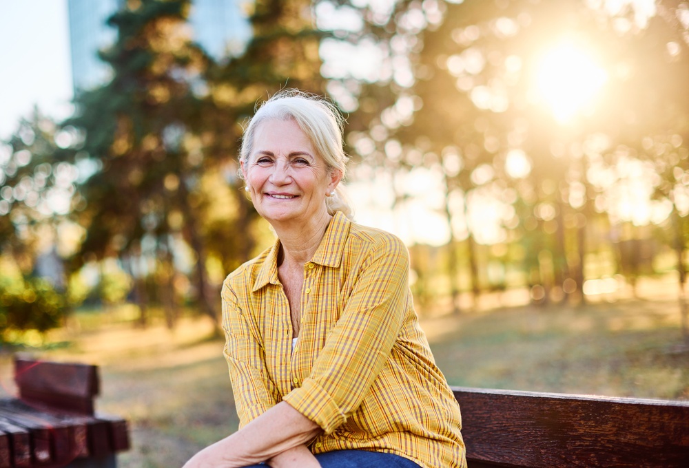 Smiling senior woman representing quality dental care for older adults in Spokane, WA